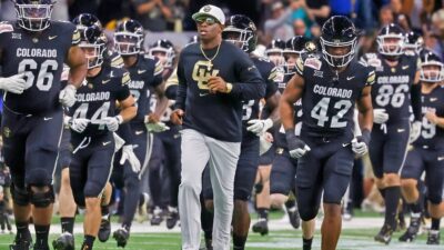 Deion Sanders running out with Colorado Buffaloes