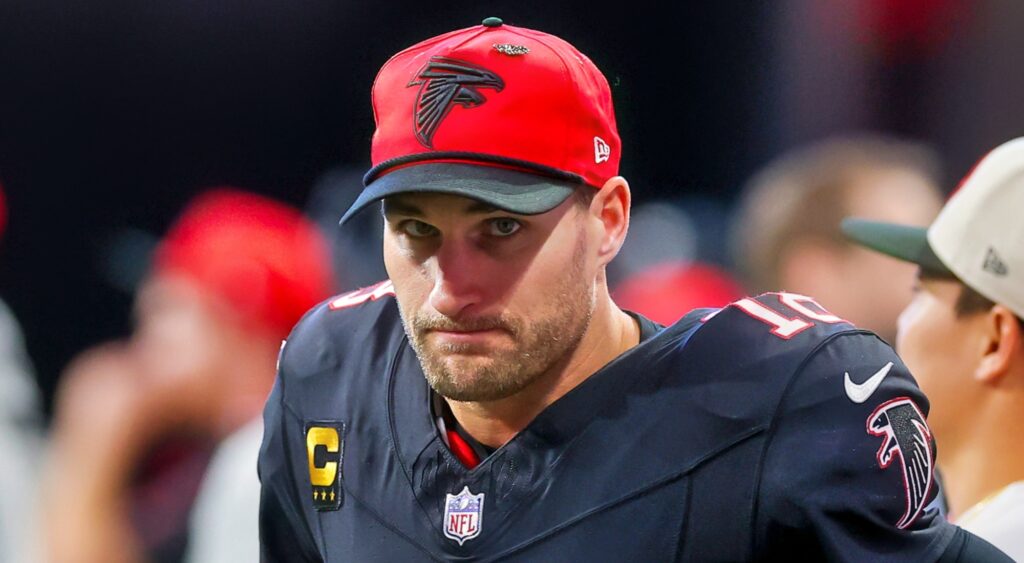 Kirk Cousins of Atlanta Falcons looking on.