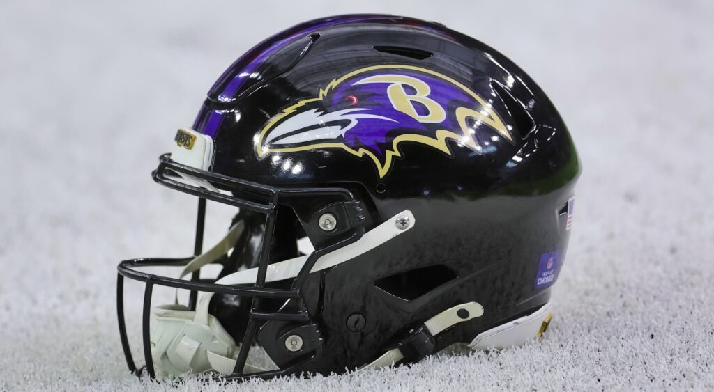 Baltimore Ravens helmet shown on field. The team has signed Diontae Johnson.