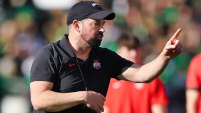 Ohio State Buckeyes HC Ryan Day pointing