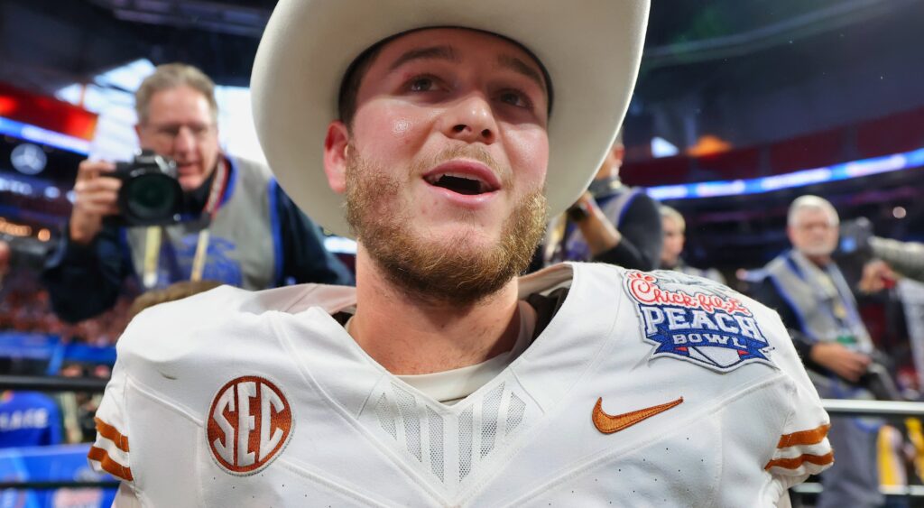 Quinn Ewers in Texas uniform and cowboy hat