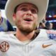 Quinn Ewers in Texas uniform and cowboy hat