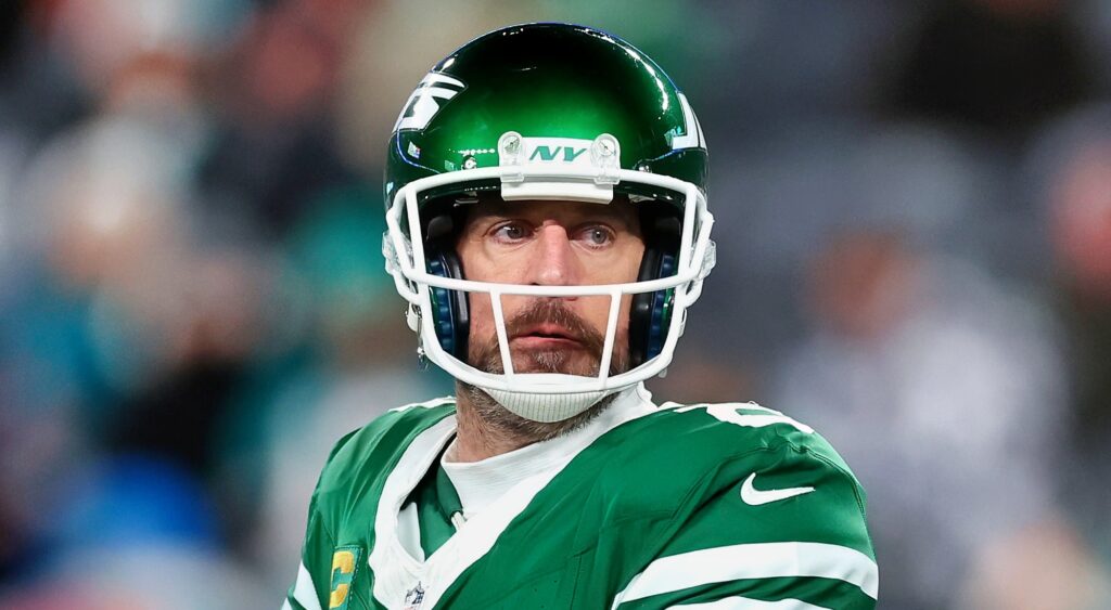 Aaron Rodgers of New York Jets looking on.