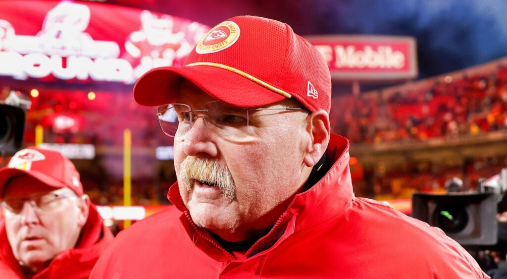 Andy Reid looking on.