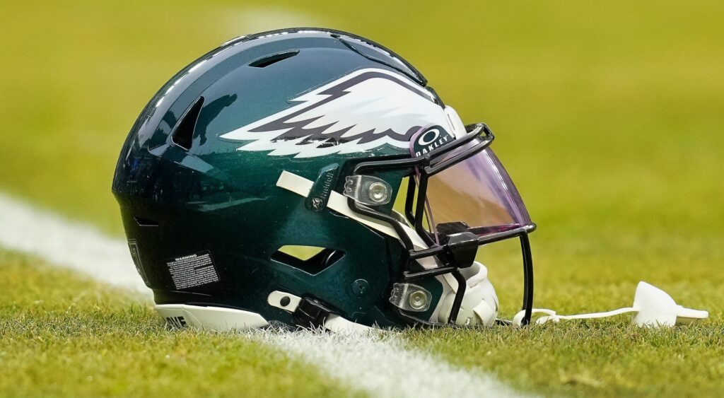 Philadelphia Eagles helmet shown on field. Brandon Graham may be back for the postseason.