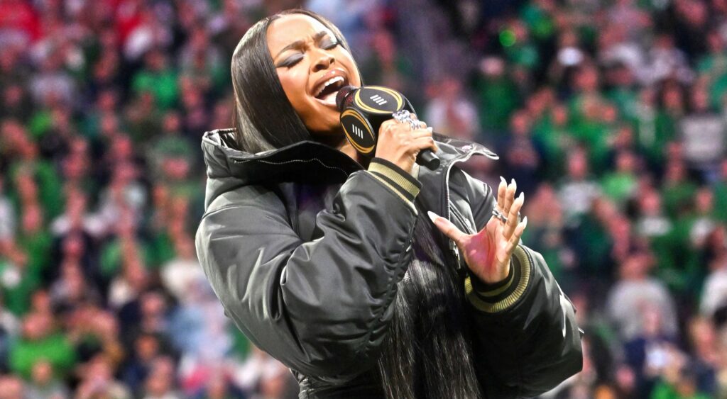 Coco Jones singing the national anthem