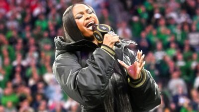 Coco Jones singing the national anthem