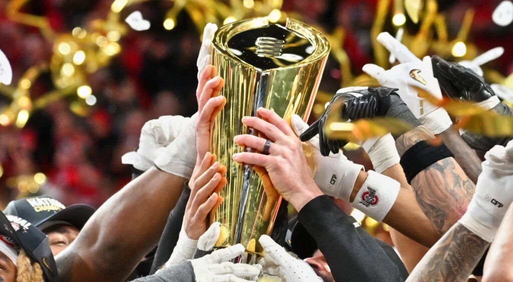 Players holding National Championship trophy