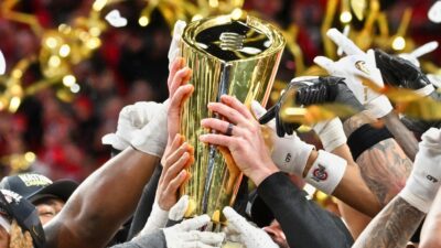 Players holding National Championship trophy