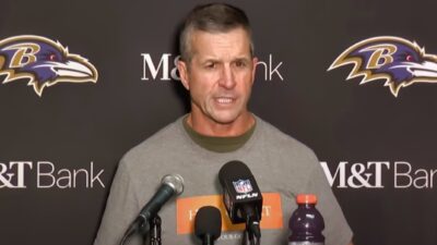 John Harbaugh speaking to reporters