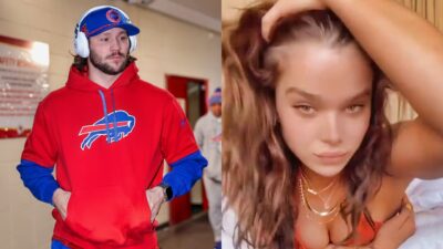 Josh Allen in Bills gear and Hailee Stenfield in bikini on bed