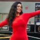 Molly Qerim posing in red outfit