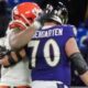 Myles Garrett and Roger Rosengarten on field