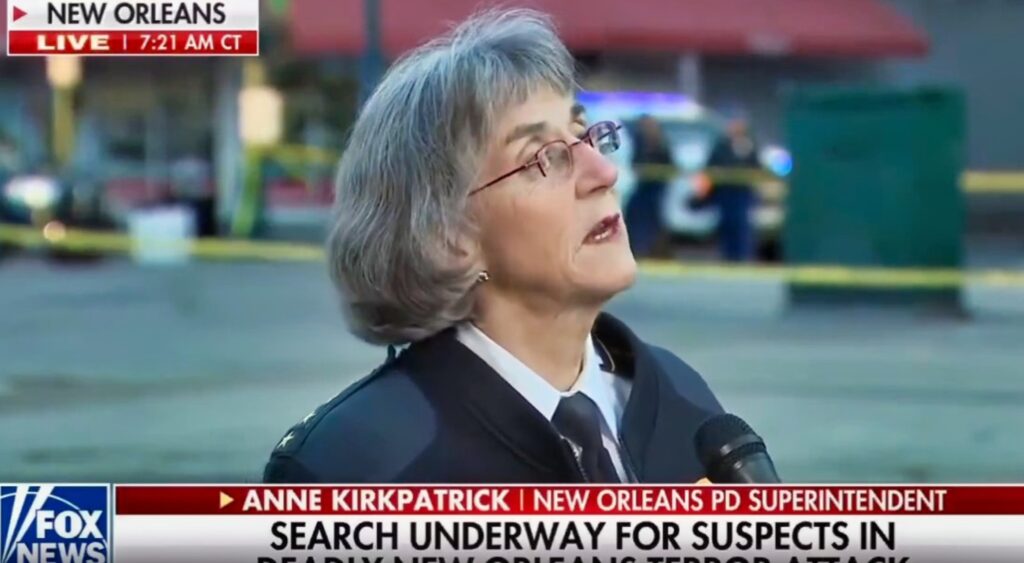 New Orleans Police Superintendent Anne Kirkpatrick speaking to reporter