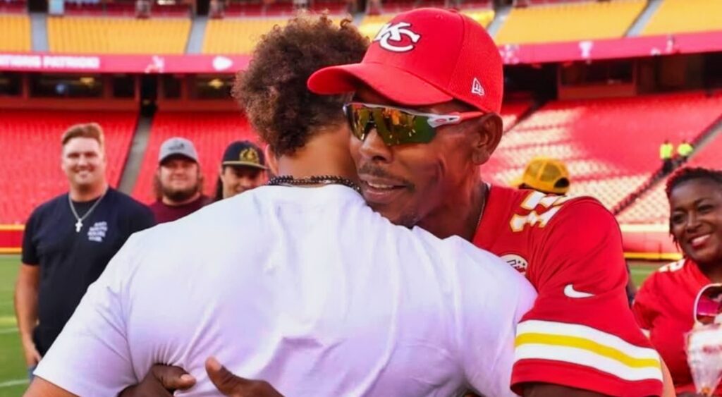 Pat Mahomes Sr. hugs his son.