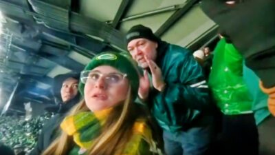 Philadelphia Eagles fan yelling at Packers fan