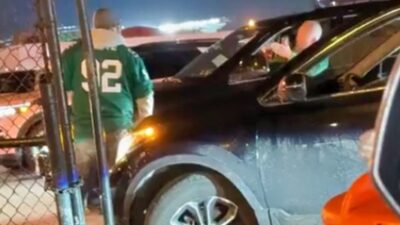 Philadelphia Eagles fans arguing in parking lot