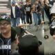 Raiders and Chargers fans fighting in concourse area