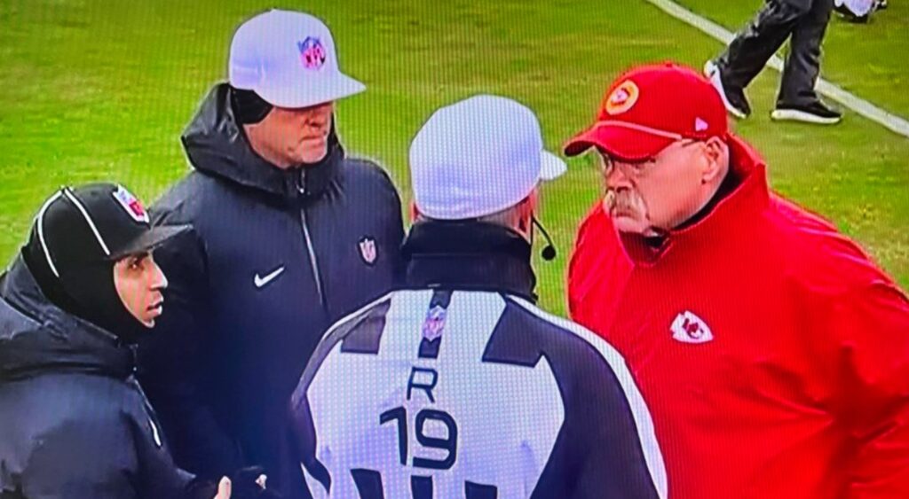 NFL refs talking to Andy Reid before game.