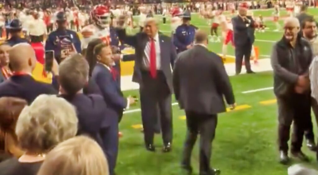 Chris Jones and Donald Trump on field