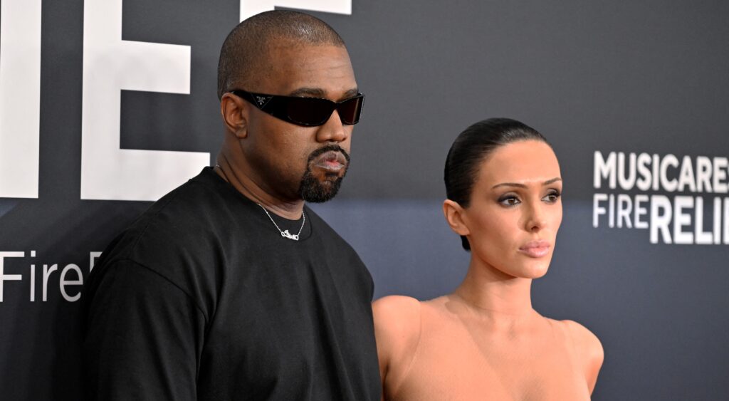 Kanye West (L) and Australian model Bianca Censori posing at Grammys