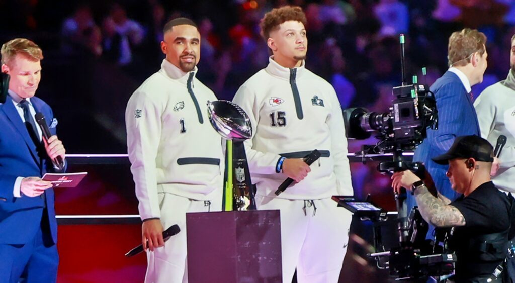 Eagles QB Jalen Hurts and Chiefs QB Patrick Mahomes on stage at the Super Bowl