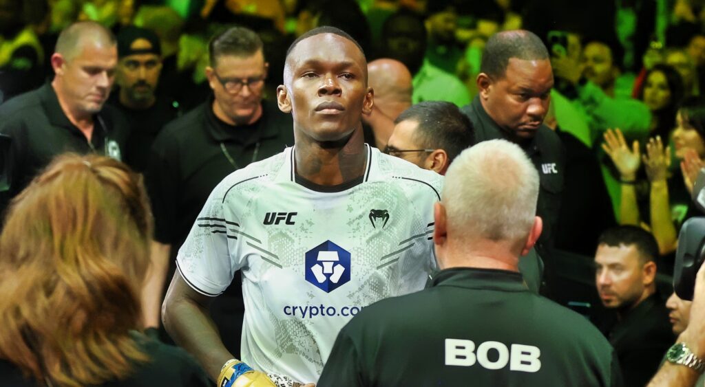 Israel Adesanya teases a somber update on his UFC future after a brutal loss, sparking speculation about his next move in MMA