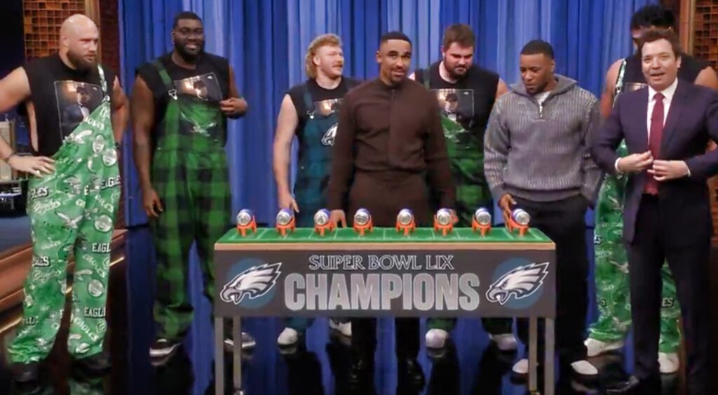 Jalen Hurts and Saquon Barley with Eagles offensive line Jimmy Fallon