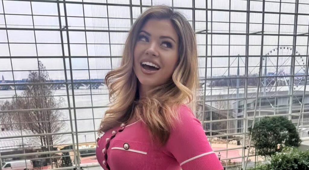 Natalie Winters in pink outfit