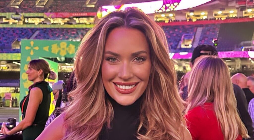 Paige Spiranac smiling at Super Bowl event