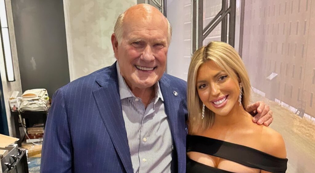 Terry Bradshaw and Amanda Vance posing