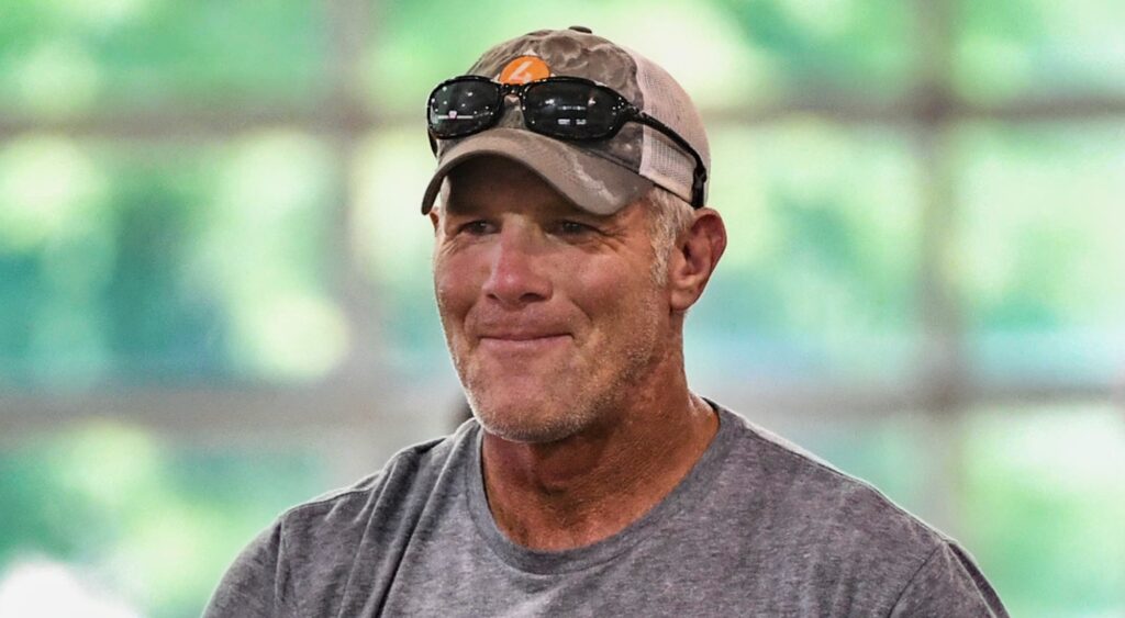 Brett Favre looking on at event.