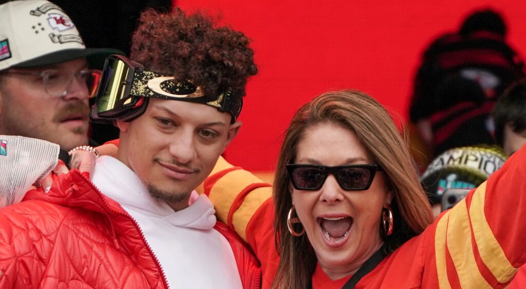 Patrick Mahomes and Randi Mahomes celebrating at Super Bowl parade.