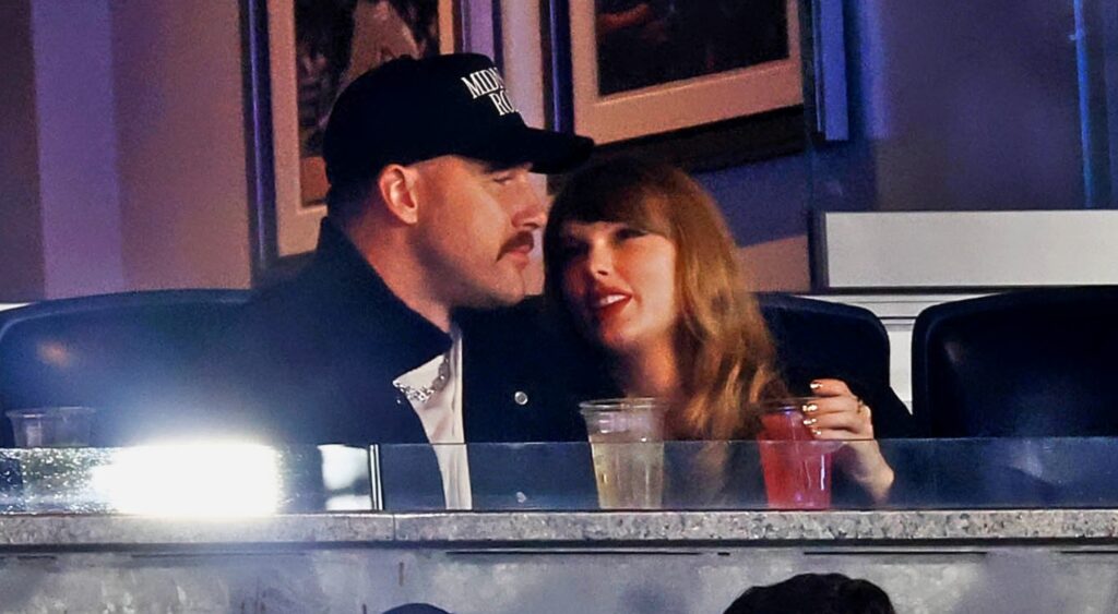 Travis Kelce and Taylor Swift in suite