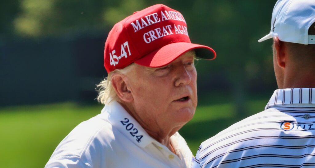 Donald Trump golfing.