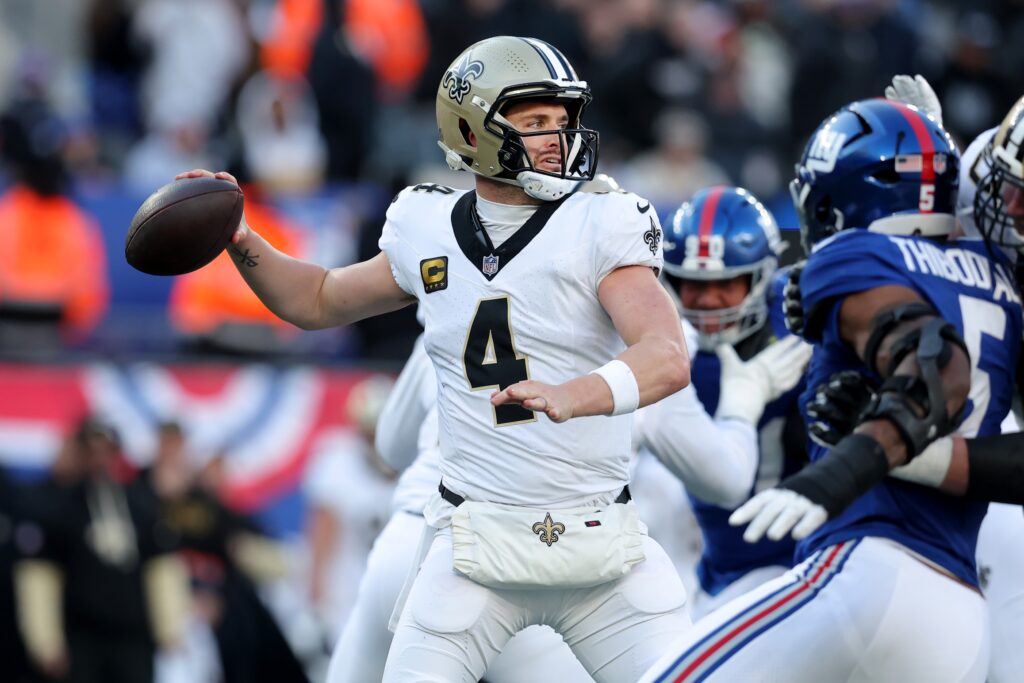 Derek Carr looking to throw.