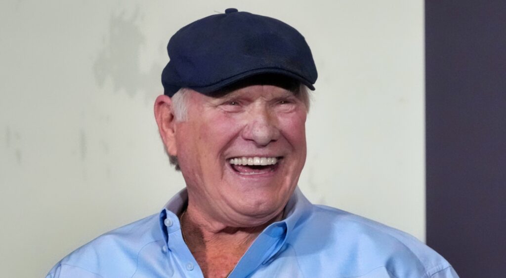 Terry Bradshaw smiling at event.