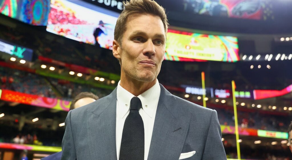 Tom Brady wearing suit