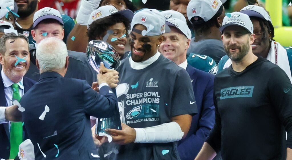 Jalen Hurts holding Super Bowl trophy.