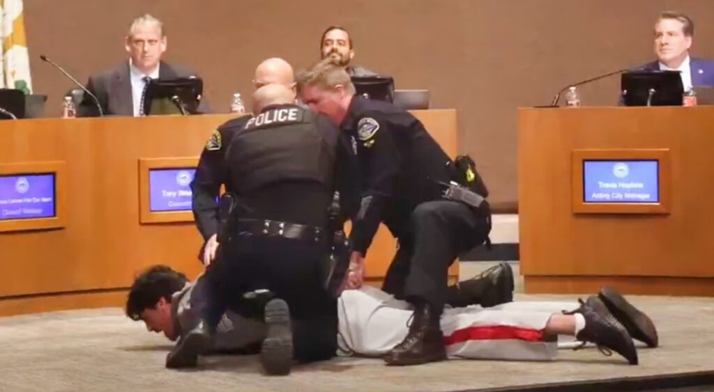 VIDEO: Former NFL Punter Arrested After Causing A Major Scene At "MAGA" City Council Meeting In California