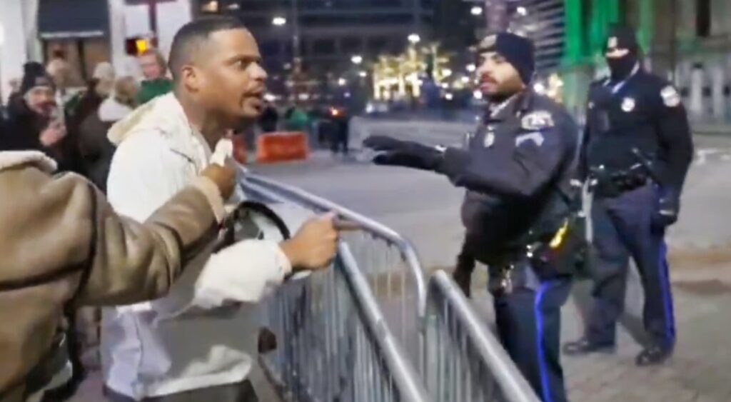 Philadelphia Eagles fan confronting cops on streets.