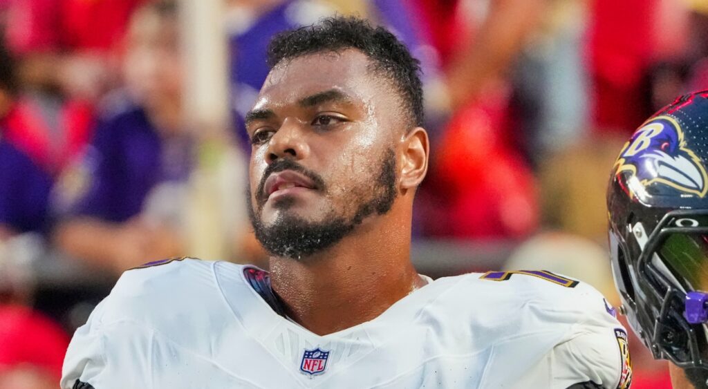 Ronnie Stanley of Baltimore Ravens looking on.