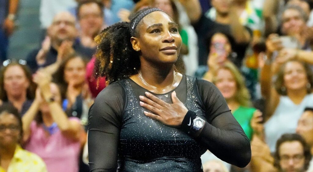 Serena Williams reacts at tennis match.